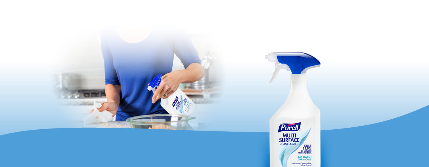 Person using PURELL Surface spray on the counter